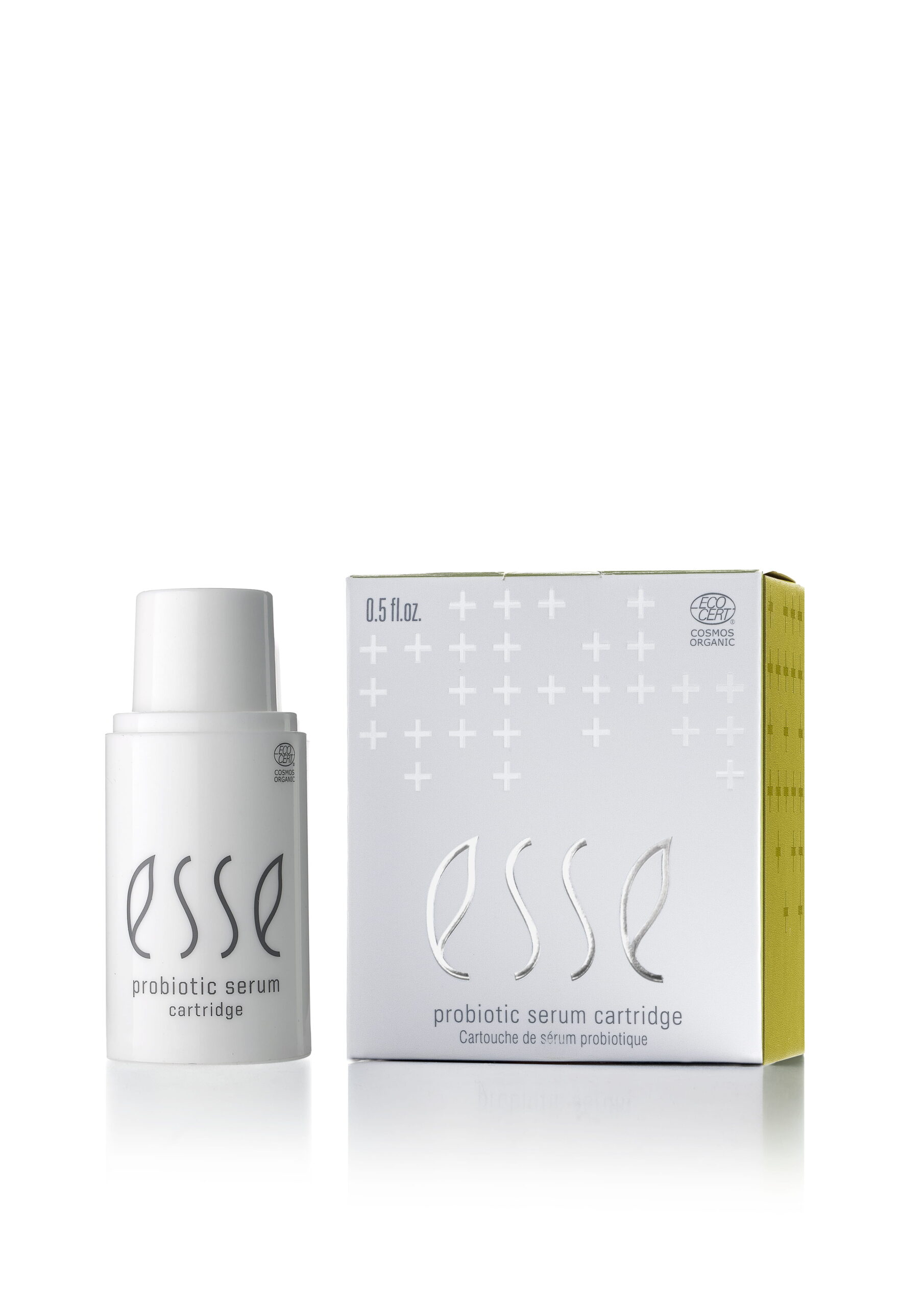 A white bottle of Esse Probiotic Serum stands beside its box, both with minimal grey text and plus signs; the box features a yellow side panel.
